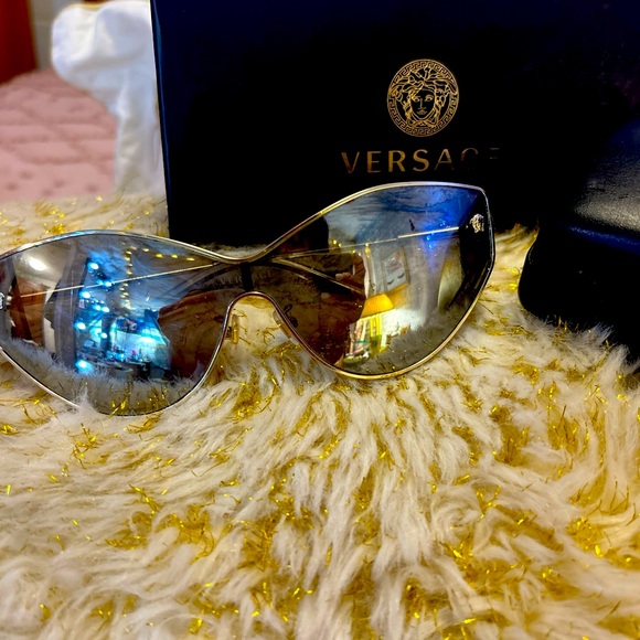 Versace gold frame light grey lenses sunglasses.  Barely worn, no flaws. main image 4